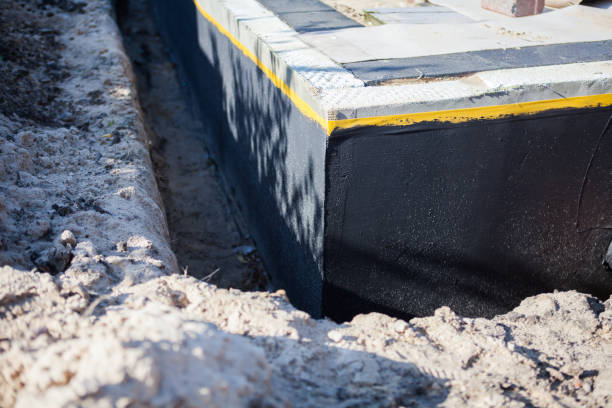 Professional Waterproofing technician working in Georgetown, IL